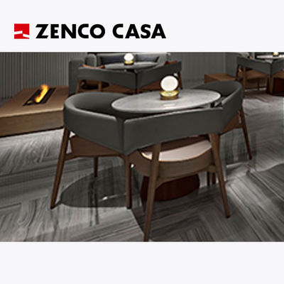 Muebles de ocio del hotel con mesa redonda de mármol y sillas de cuero