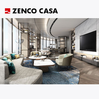 El conjunto de muebles del salón ejecutivo del hotel incluye un sofá de tela y una mesa de café.